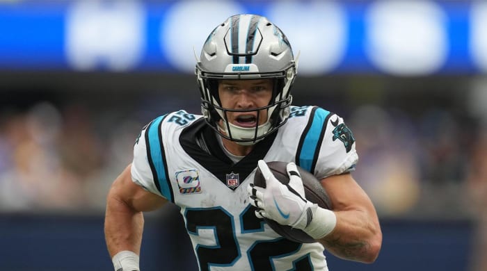 Oct 16, 2022; Inglewood, California, USA; Carolina Panthers running back Christian McCaffrey (22) carries the ball against the Los Angeles Rams in the first half at SoFi Stadium.